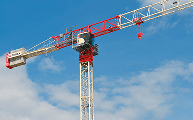 Terex Flat Top Tower Crane lifting materials at a construction site in the Canada